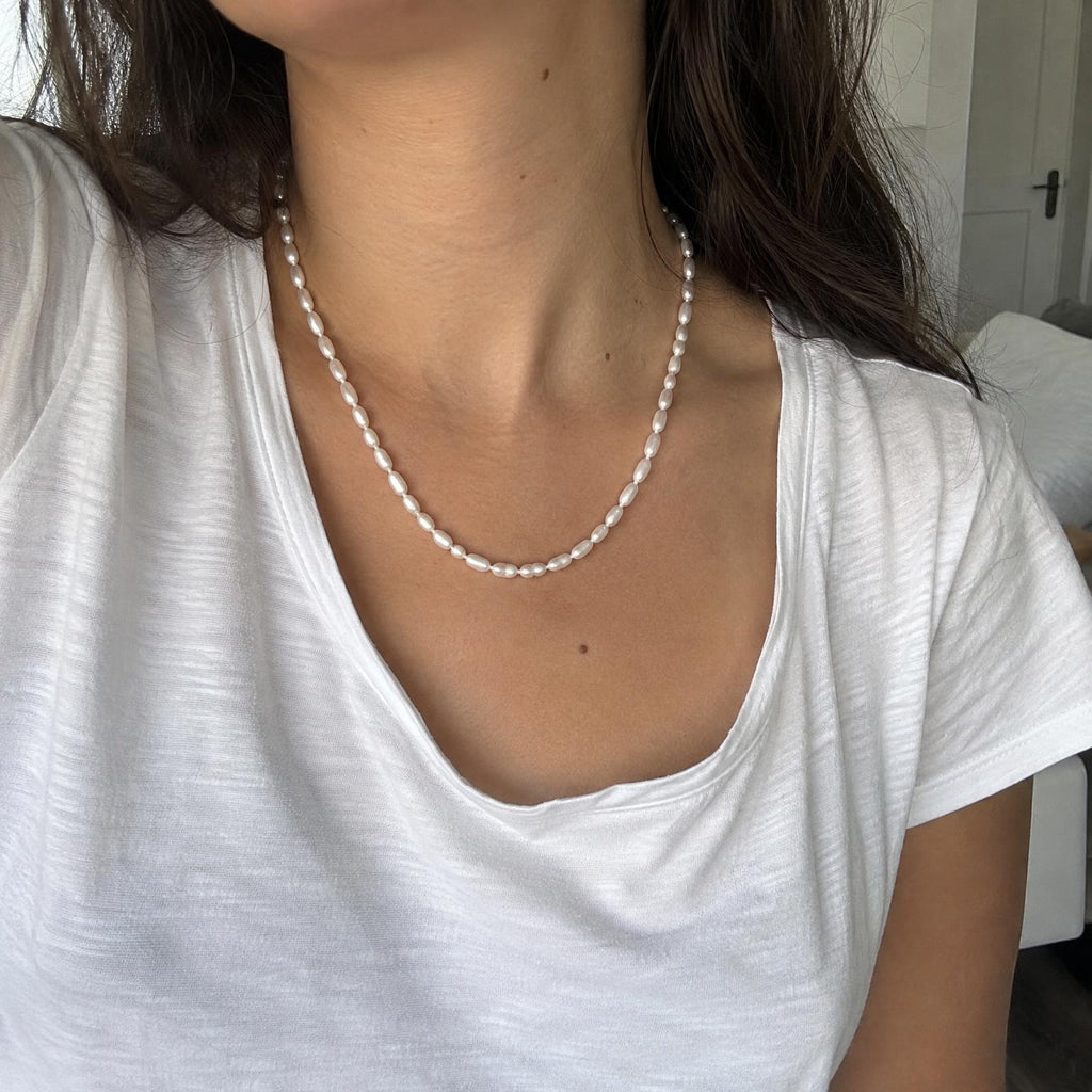 OLLA freshwater pearl necklace worn on neck
