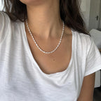 OLLA freshwater pearl necklace worn on neck